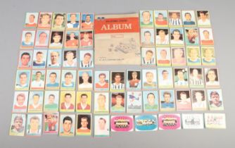 A large collection of 1960's A&BC/Bazooka football trading cards, to include partly filled album,