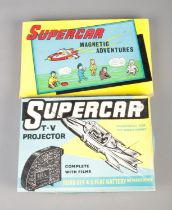 Two vintage boxed Supercar sets to include T.V Projector and Magnetic Adventures.
