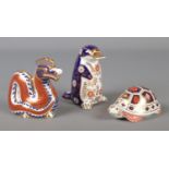 A Collection of three Royal Crown Derby paperweights in the form of a Dragon, Tortoise and a