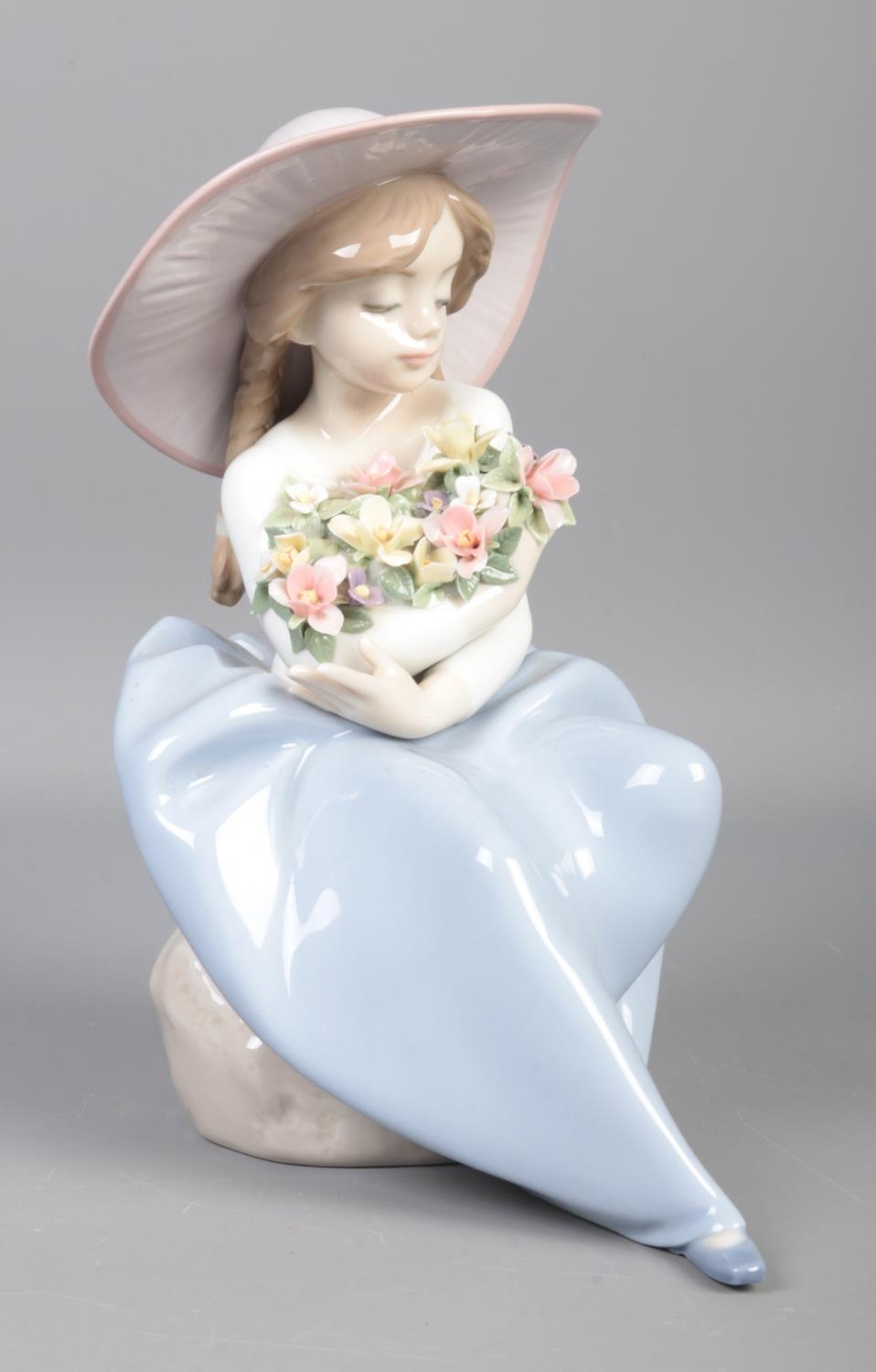 A Lladro figure, titled: 'Fragrant Bouquet Girl', No. 5862. Good condition. - Image 2 of 3