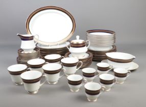 A Noritake Legacy Vienna dinner service including tea cups and saucers, sugar bowl, milk jug,