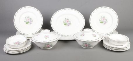 A collection of Susie Cooper 'Fragrance' dinnerwares. Includes tureens, meat plate, dinner plates,