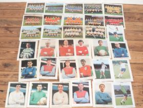 Thirty three Typhoo Tea football picture cards, to include individual players (Geoff Hurst, Roger