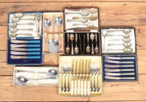 A collection of EPNS and silver plate flatware, mostly boxed. Includes coffee spoons and sugar tongs