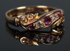 An Edwardian 18ct Gold, Ruby and Diamond five stone ring. Size L. Total weight: 2.6g