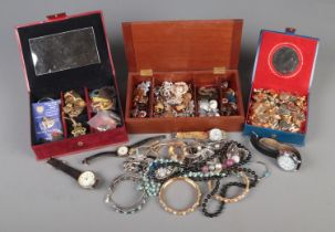 A collection of mixed costume jewellery, charms and accessories. To include a quantity of military