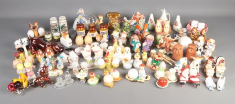 An extensive collection of mainly salt and pepper cruet sets. To include West German Golfing