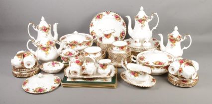 A Royal Albert Old Country Roses tea service to include two tureens, teapot, several coffee pots,