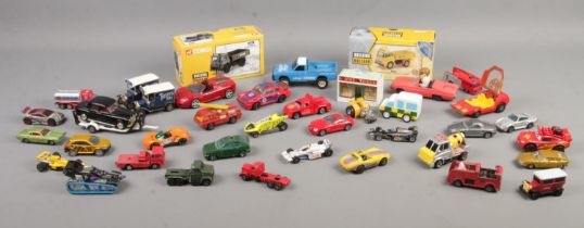 A collection of diecast vehicles, including boxed Corgi 'Building Britain', Matchbox Speed Kings and