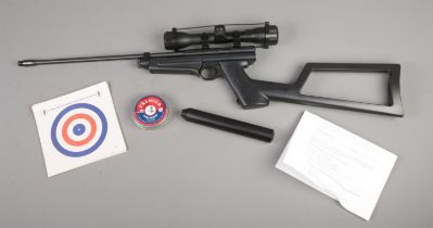 A Crossman 2250XL Model 1399 Custom Stock .22cal air rifle, complete with silencer, scope,