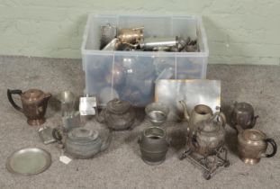 A large box of metalwares for restoration. Includes teapots, hip flasks, spirit kettle, etc.