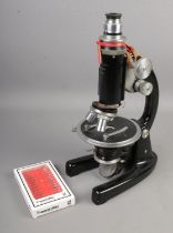 J Swift & Son of London microscope, serial no.25689 with a box of prepared slides of insect legs and