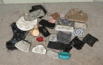 A good collection of vintage handbags, clutches and purses to include several heavily beaded