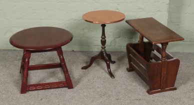 A collection of occasional furniture to include copper topped table and magazine rack.