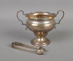 A small Sheffield silver twin handled trophy cup hallmarked for Mark and Willis (Date indistinct,