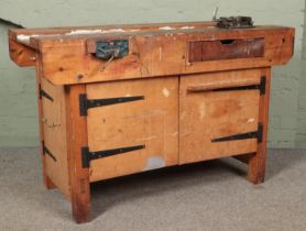 A work bench with cupboard base and Paramo vice. (87cm x 138cm x 61cm)