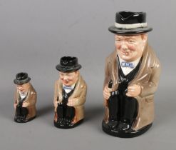 A graduated set of three Royal Doulton character jugs in the form of Winston Churchill.