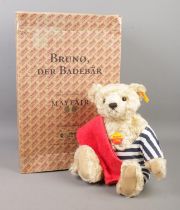 A boxed Steiff bear; Bruno, Der Badebar, the swimming bear. 34cm tall. With growler, tag and