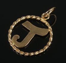 An 18ct pendant formed as the letter J. Total weight 1.36g.