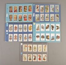 One album of complete sets Including Will's Flag Girls, Lucky Charms, Player's Military Head-