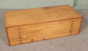 A vintage plans/specimen chest with brass handles. Hx33cm Wx111cm Dx48cm