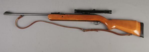 A BSA Airsporter .22 cal underlever air rifle with BSA 4x20 scope. CANNOT POST.