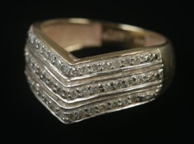 A 9ct gold three row diamond wishbone ring. Size M, 2.94g.