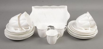 A collection of Shelley blanc de chine leaf design teawares.