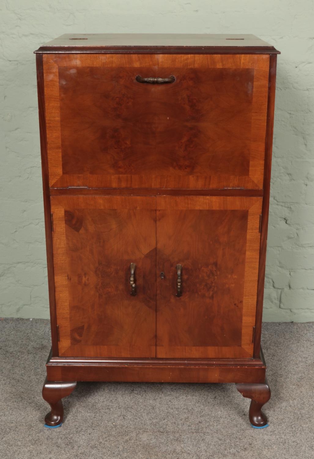 A vintage Cocktail cabinet with mirrored interior