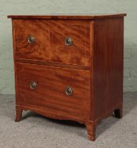 A Georgian mahogany cabinet with cupboard top and drawer base. 75cm x 66cm x 46cm.