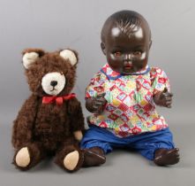 A Kader doll, together with a jointed mohair bear.