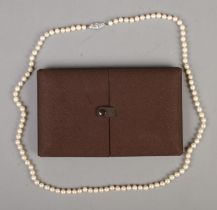 A boxed cultured pearl necklace. Approx. length when closed 39cm.