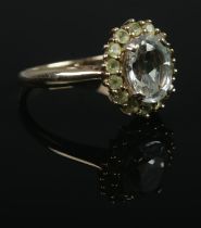 A 9ct Gold cluster dress ring, set with paste and colourless stones. Size N. Total weight: 4g.