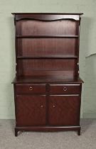 A stag minstrel mahogany dresser. Approx. dimensions 97cm x 172cm x 45cm.