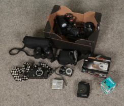 A box of assorted cameras and equipment to include Vivitar 250/SL, Panasonic DMC-TZ3, Panagor Auto-