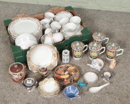 Two boxes of Oriental ceramics. Includes Japanese porcelain dinner service, Satsuma style