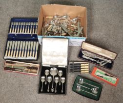 A box of cased and loose cutlery. Includes fish cutlery, Steels cased spoon set, Viners, James Dixon