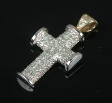 A 9ct white gold and diamond set crucifix pendant. Total weight 3.29g.