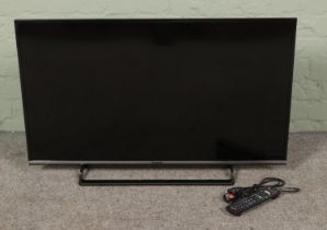 A Panasonic TX-40DS500B 40" Smart TV, with remote. In working order.