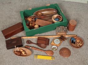 A box of wooden items. Includes Short & Mason barometer, Stanley yard stick, Swiss musical cigarette