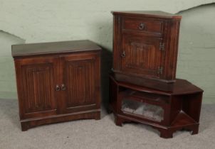 A collection of assorted furniture to include linen fold cupboard including corner cupboard