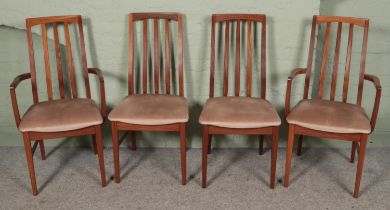 A set of eight William Lawrence & Co teak dining chairs, including two carvers.