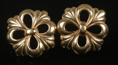 A pair of 9ct gold earrings featuring scroll work design. Total weight 3.87g.