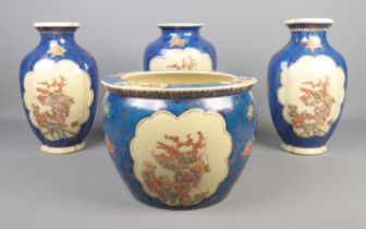 A collection of large hand painted Satsuma ceramics including three vases and a jardiniÃ¨re. Tallest