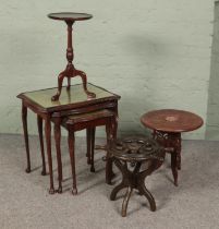 Four small occasional tables. Includes nest of three tables, ships wheel example, small wine table