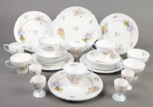 A small collection of Shelley 'Wild Flowers' teawares. Includes cups & saucers, egg cups, sandwich