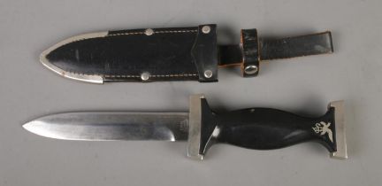 A possibly WWII Ern by Solingen black panther dagger featuring etched inscription to blade. With