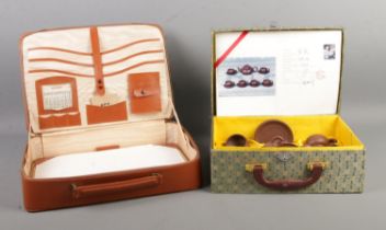 A mid Twentieth Japanese child's tea service in box, together with a hinged travelling case.