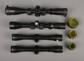 A Hawke nitrogen charged scope with a Bushnell and swiss arms example with another unbranded scope