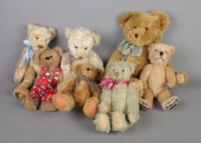 A collection of assorted teddy bears to include Merrythought, Barton Creek Collection, Heartfelt